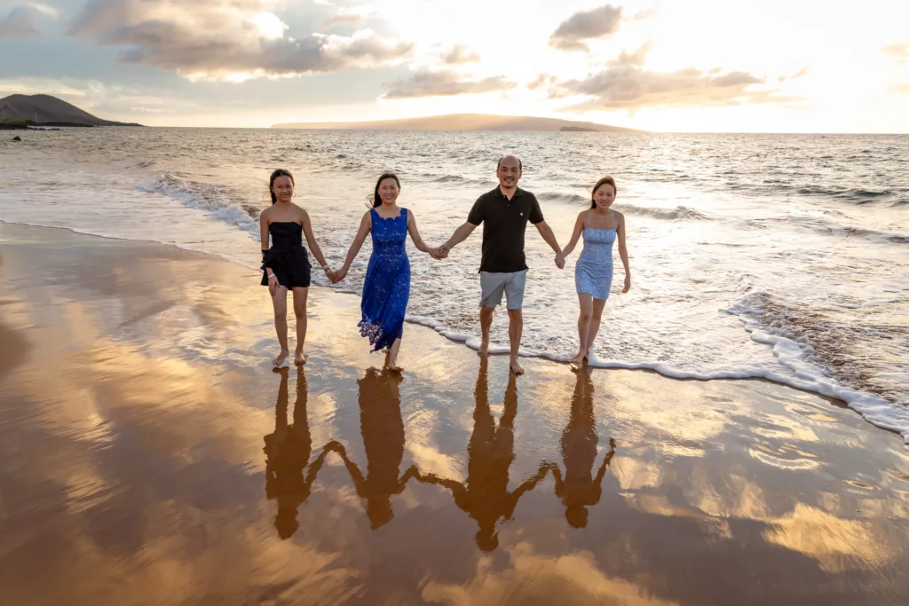 Couple enjoying a romantic sunset with Hawaiian backdrop