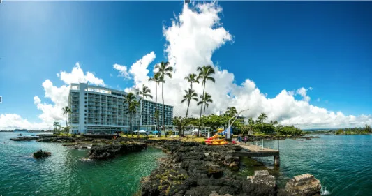 Kayaking near waterfalls and historic Hilo Bay views