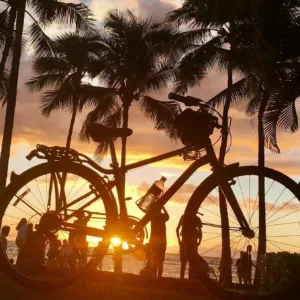 Cyclist enjoying scenic coastal views on private island bike tour