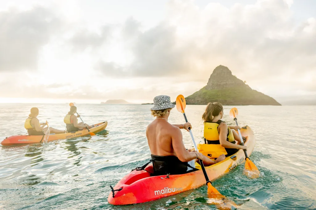 Kayakers exploring Chinaman’s Hat island waters