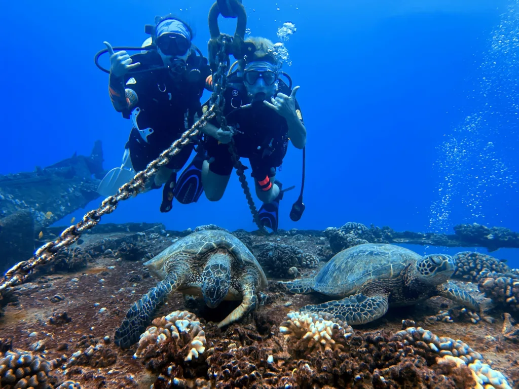 Diver practicing advanced underwater skills near coral reef