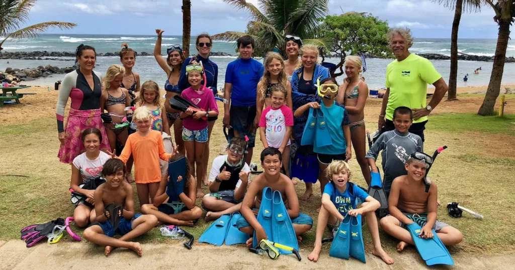 Children exploring colorful coral reefs while snorkeling