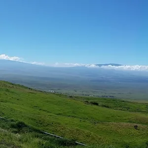 Lava flow glowing at sunset on Big Island tour