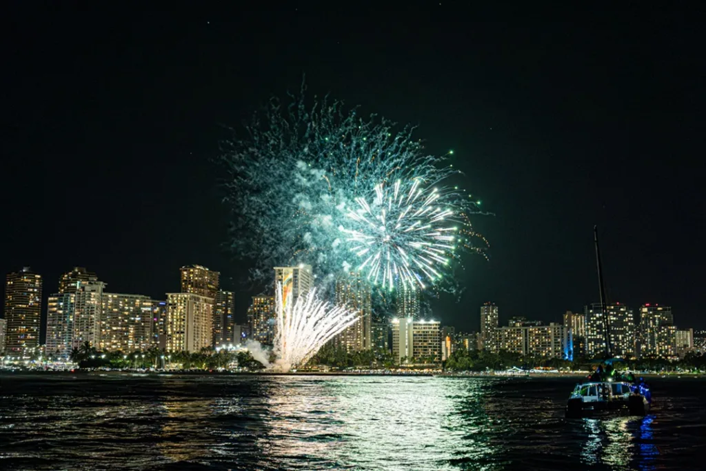 Sail under Waikiki’s night sky with fireworks display