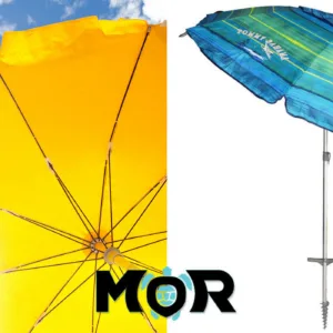 Colorful beach umbrella set up on white sandy shore