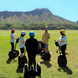 Hikers ascending Diamond Head crater trail with ocean views