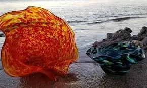 Experienced instructor guiding six-piece glassblowing lesson