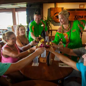 Group enjoying local dishes on a Kona walking tour