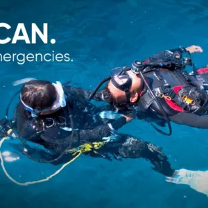 Diver practicing rescue techniques underwater