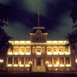 City lights glowing during Honolulu sunset tour
