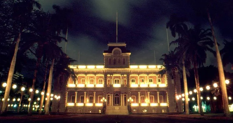 City lights glowing during Honolulu sunset tour