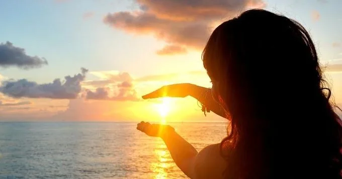 Couple enjoying serene sunset on luxury cruise boat