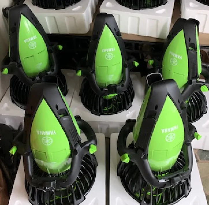 Riding a Yamaha 350LI sea scooter near tropical island