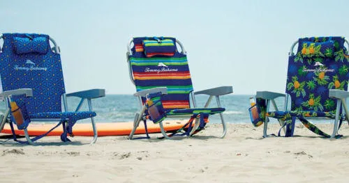 Comfortable beach chair set up facing ocean waves