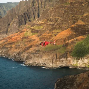 Experience a thrilling doors-off helicopter ride over Kauai’s scenery