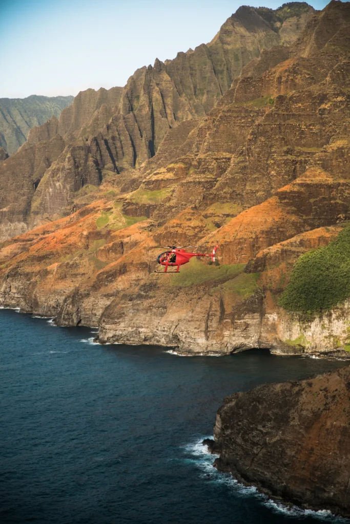 Experience a thrilling doors-off helicopter ride over Kauai’s scenery