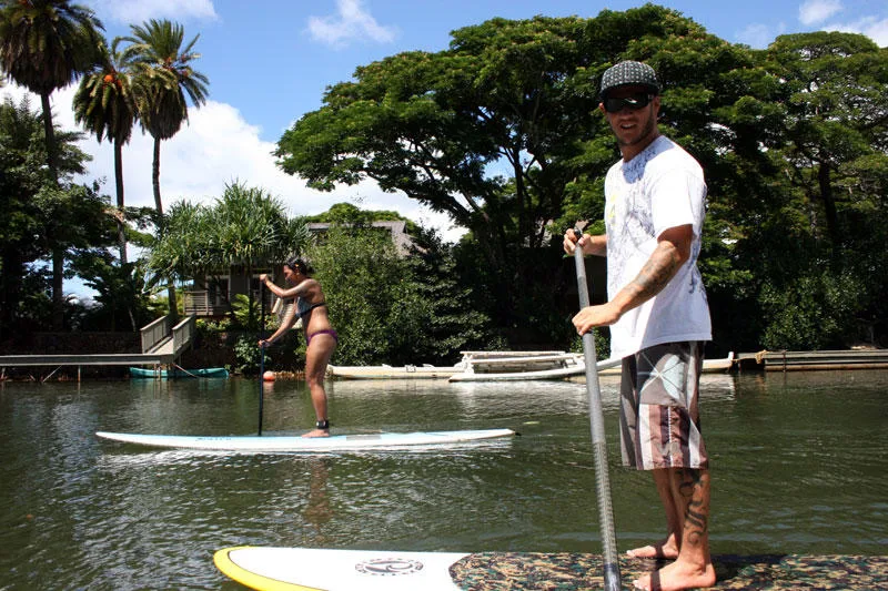 Semi-private SUP lesson with small group on tranquil bay