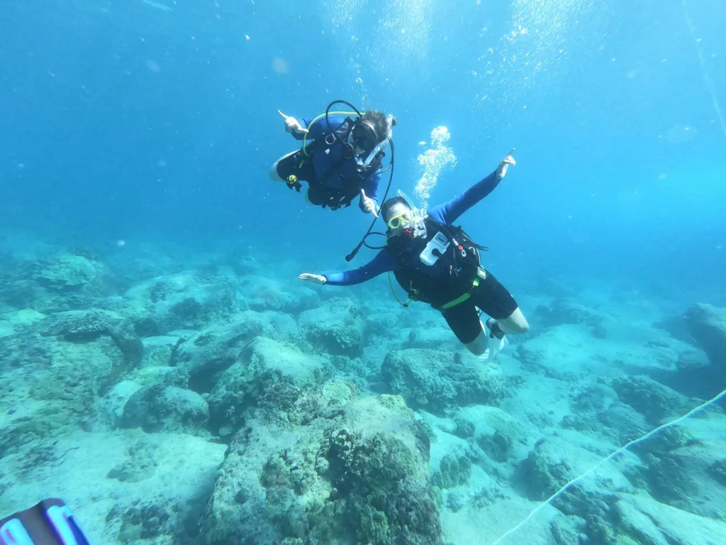 Scuba divers preparing for open water referral dive