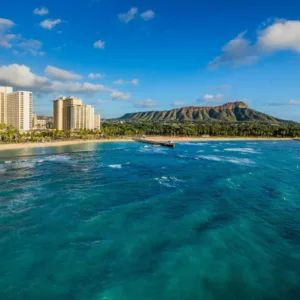 Cruise boat sailing along Waikiki coastline