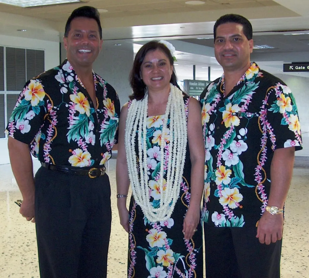 Welcoming guests with traditional lei greeting at Hilo airport