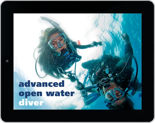 Experienced diver exploring deep ocean waters