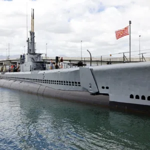 Visitors exploring Pearl Harbor on a deluxe tour with lunch