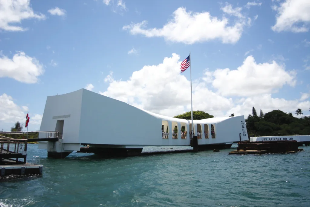 Historic Arizona Memorial at Pearl Harbor under blue sky
