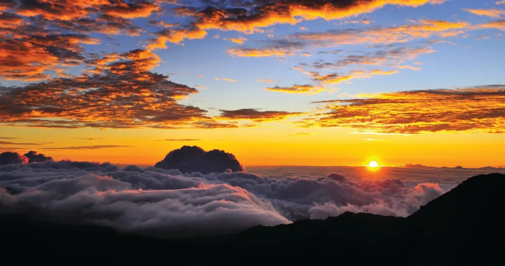 Watch sunrise over Haleakala volcano with included breakfast experience