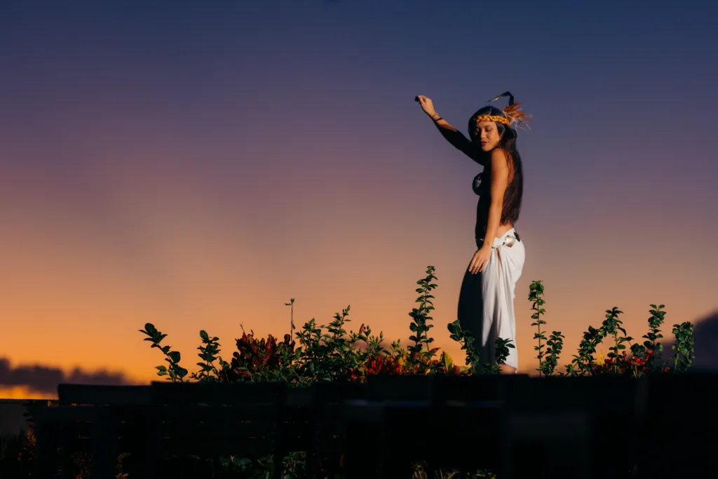 Guests enjoying traditional Hawaiian luau with live performances
