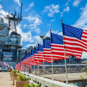 Historic Pearl Harbor memorial with battleship in background