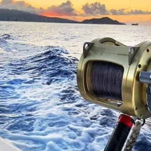 Private boat cruising along Oahu's coastline