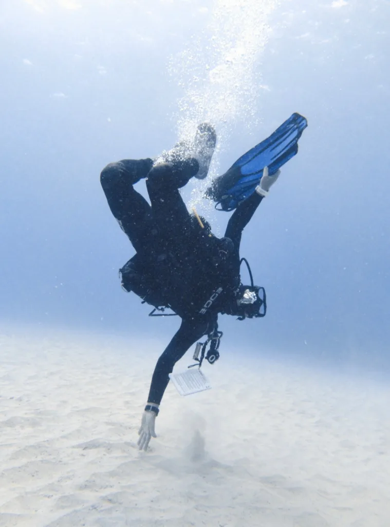 Diver practicing underwater skills during Kona course
