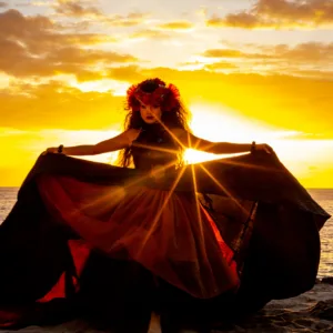Guests enjoying Feast and Fire Luau at sunset