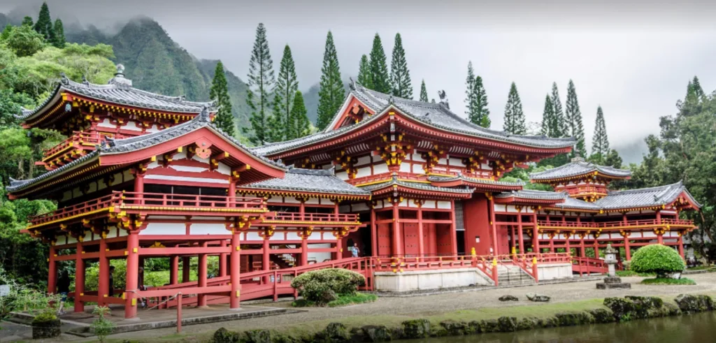 Visitors exploring hidden gems of Oahu including Byodo In temple