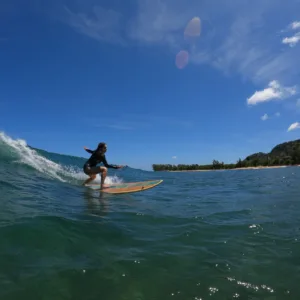 Beginner enjoying a private two hour surf lesson