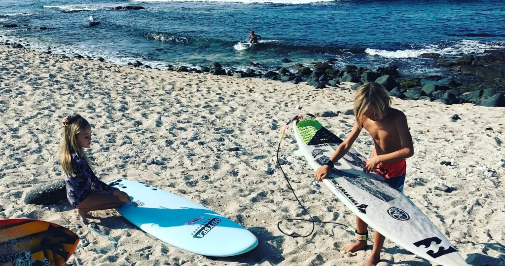 Private surf party lesson with group having fun