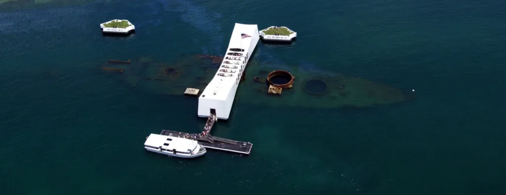 Historic USS Arizona Memorial surrounded by peaceful water