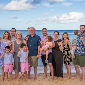 Group enjoying lively island tour with ocean views