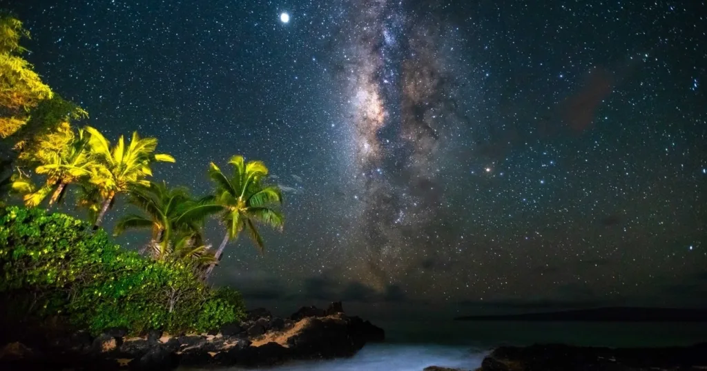 Night sky full of stars over Maui beach
