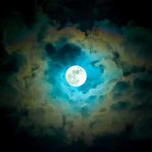 Mountain landscape under star-filled night sky