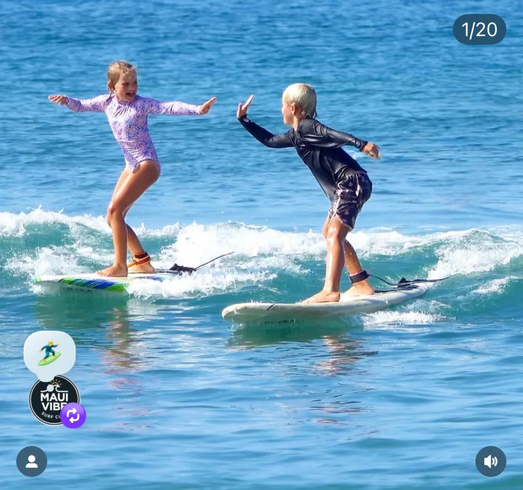 Two people enjoying semi-private surf lesson together