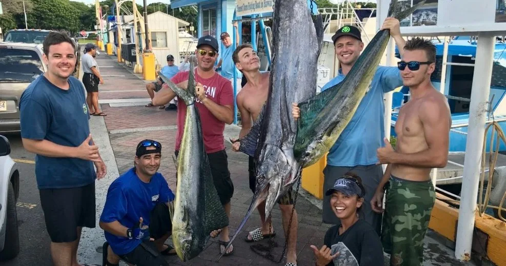Exclusive boat charter cruising along Waikiki coastline at sunset