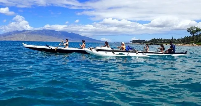 Swimming alongside turtles in the clear waters of Maui