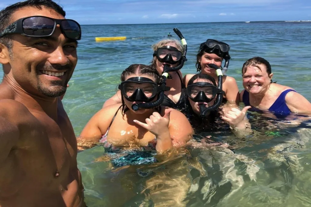 Aerial view of a secluded private island in clear blue water