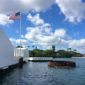 Visitors touring USS Arizona Memorial at Pearl Harbor site