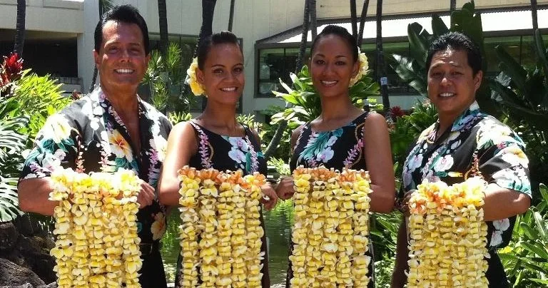 Welcoming visitor with traditional lei at Honolulu airport