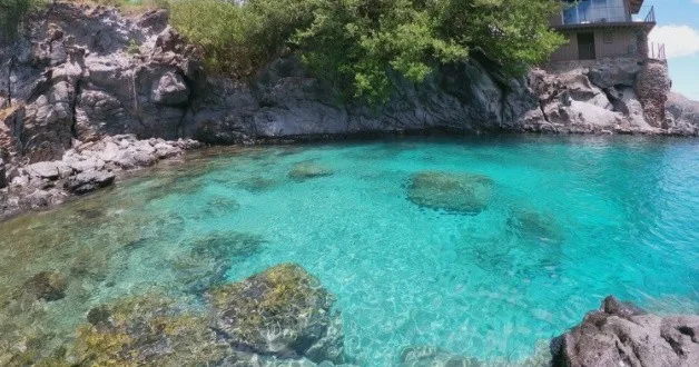 Instructor giving semi-private snorkeling lesson in ocean