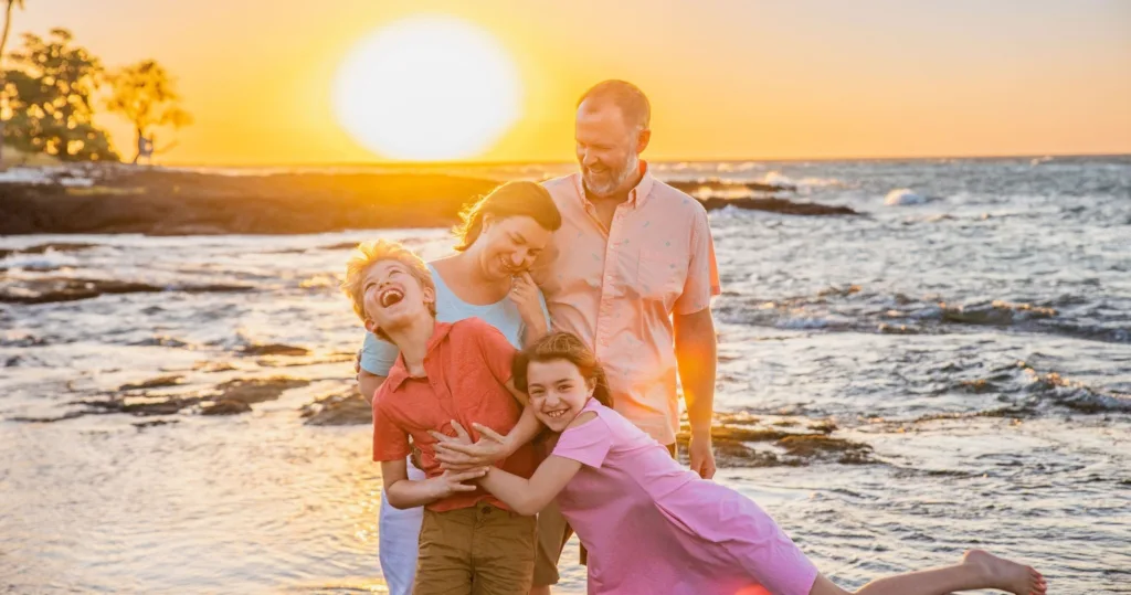 Beach portrait session during warm sunset lighting