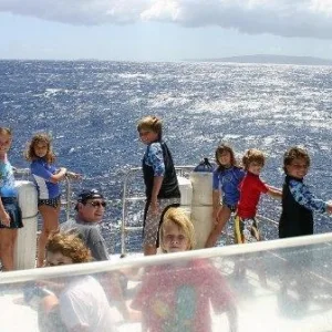 Snorkelers exploring clear waters near Molokini crater