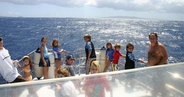 Snorkelers exploring clear waters near Molokini crater